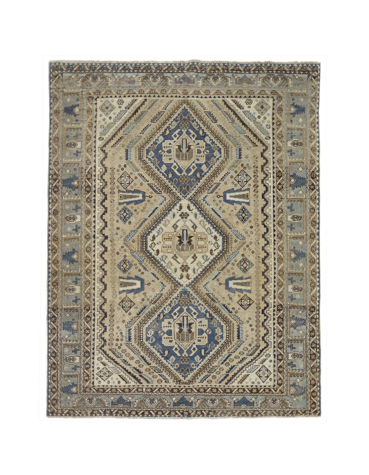 Vintage Persian Qashqai rug with blue and beige geometric diamond medallions and intricate tribal border patterns.