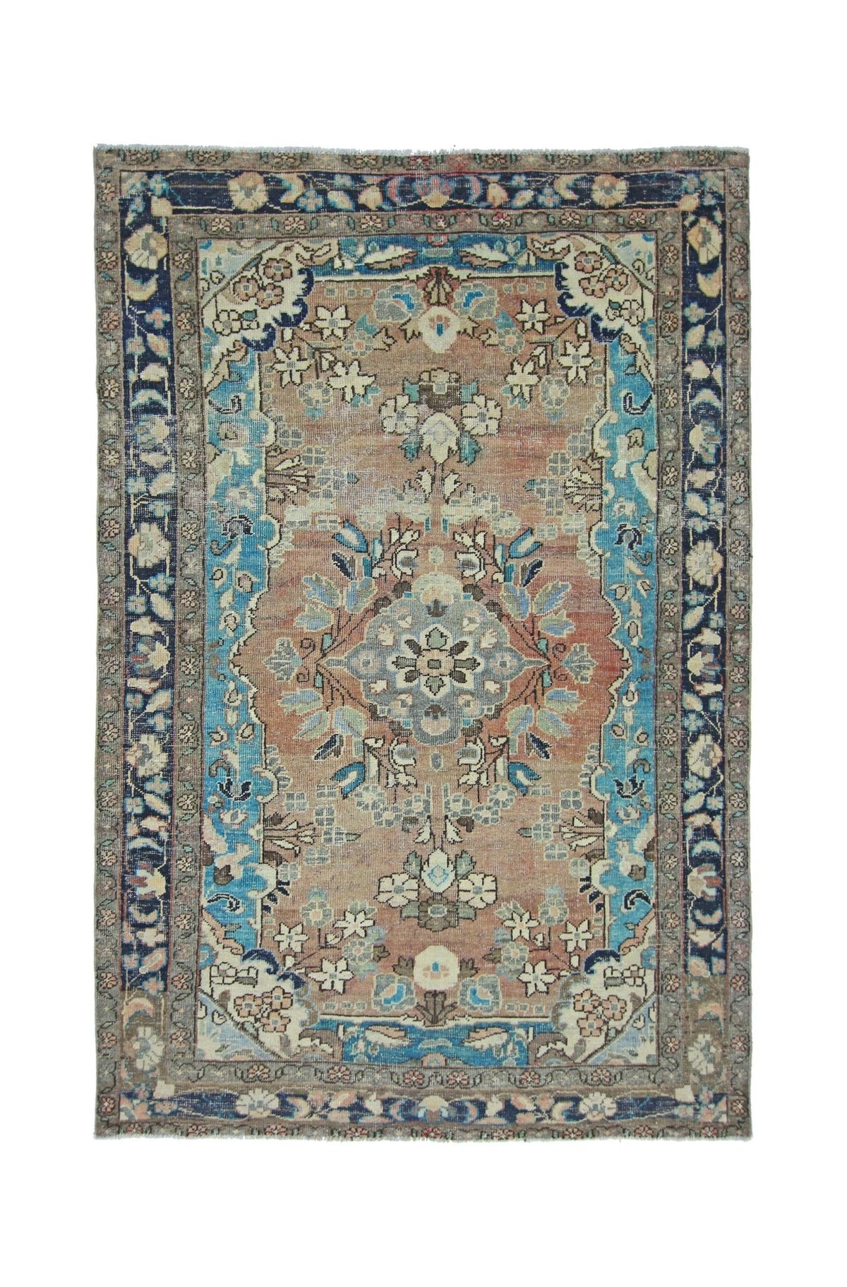 Vintage Persian Sarouk rug with a central floral medallion, intricate navy blue and terracotta patterns, and fringed ends.
