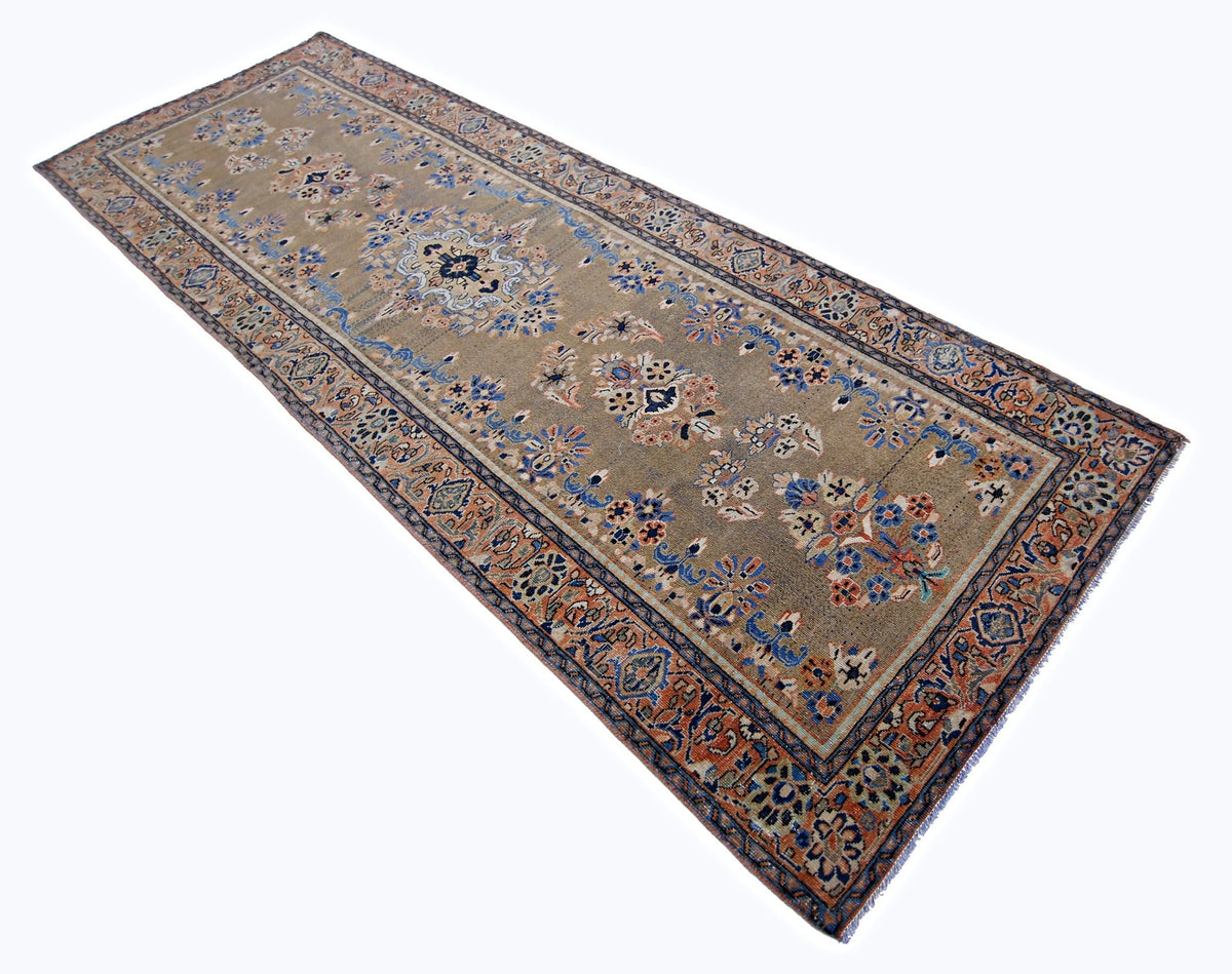 Vintage Persian Sarouk runner in wool featuring a taupe field with intricate blue and orange floral vine patterns.