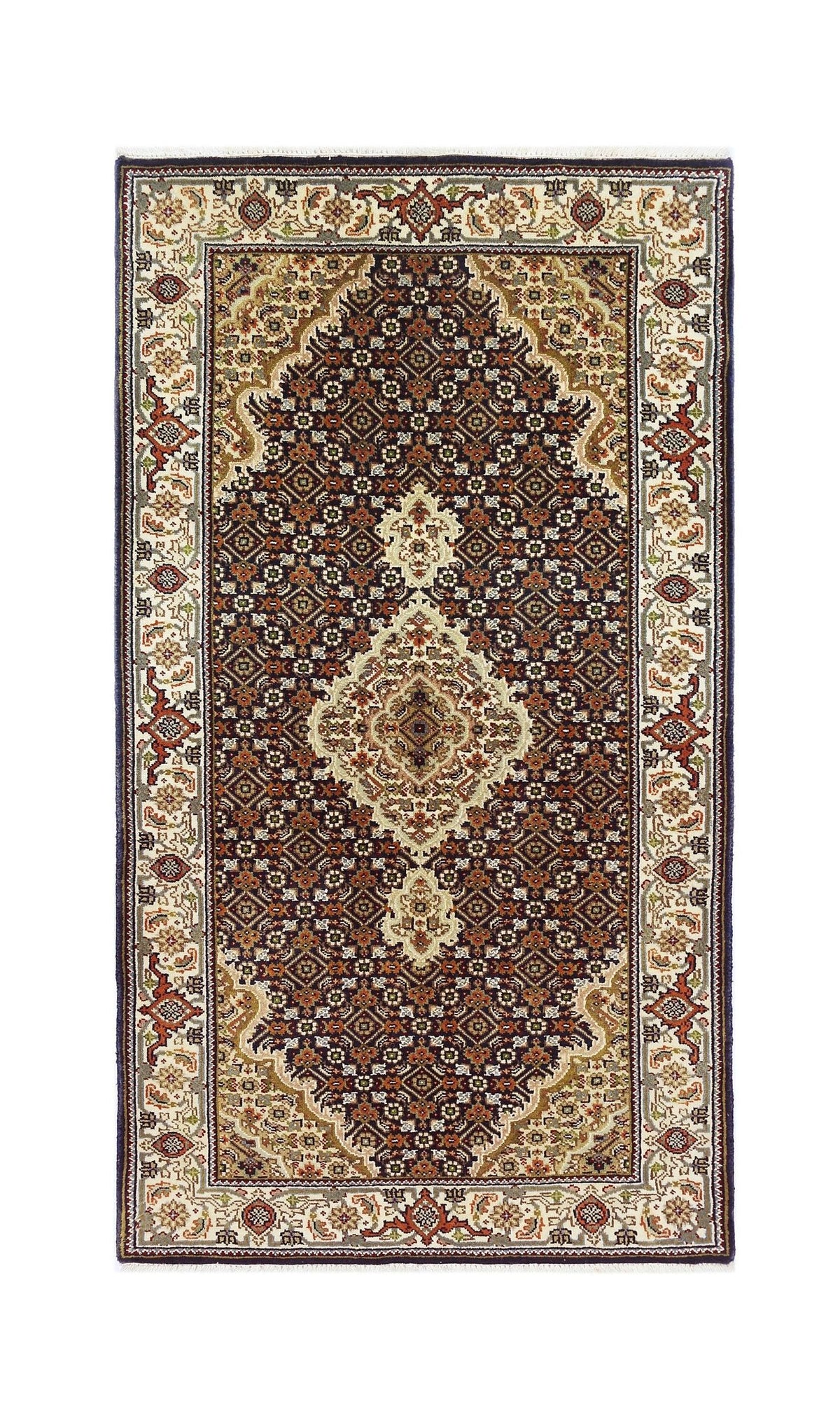 A vintage Persian silk Tabriz rug featuring an intricate floral medallion pattern in dark tones.