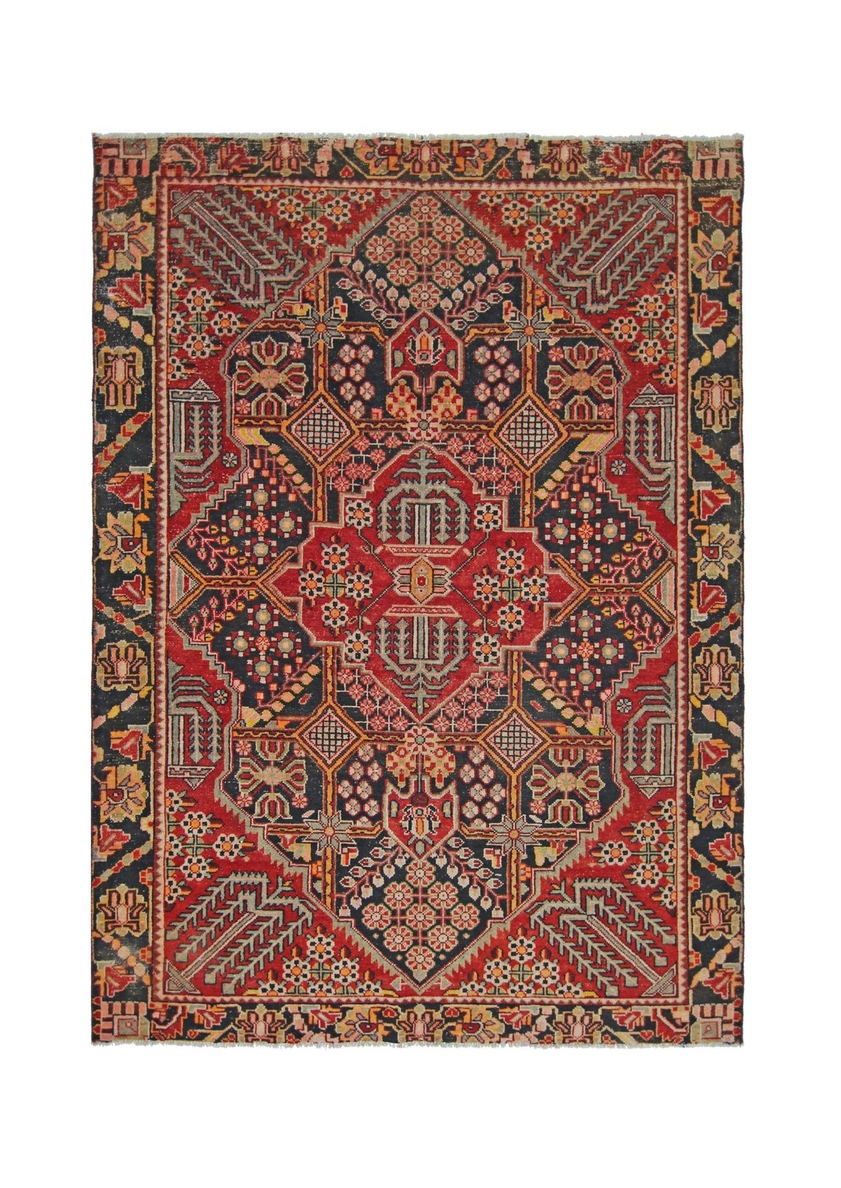 A vintage Persian Tabriz rug featuring a geometric floral pattern in red, navy, and cream tones.