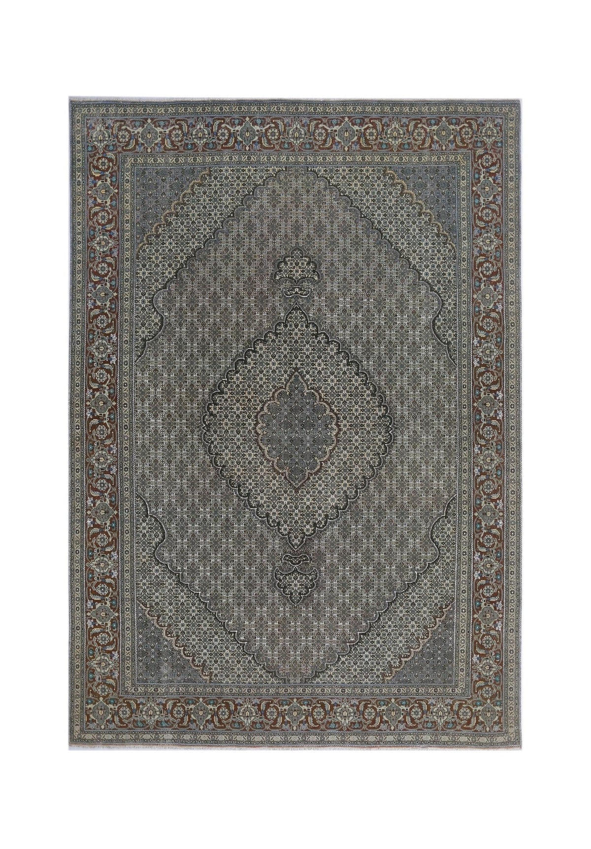 Hand-knotted vintage Persian Tabriz wool rug featuring a grey central medallion and intricate floral border in rust red.