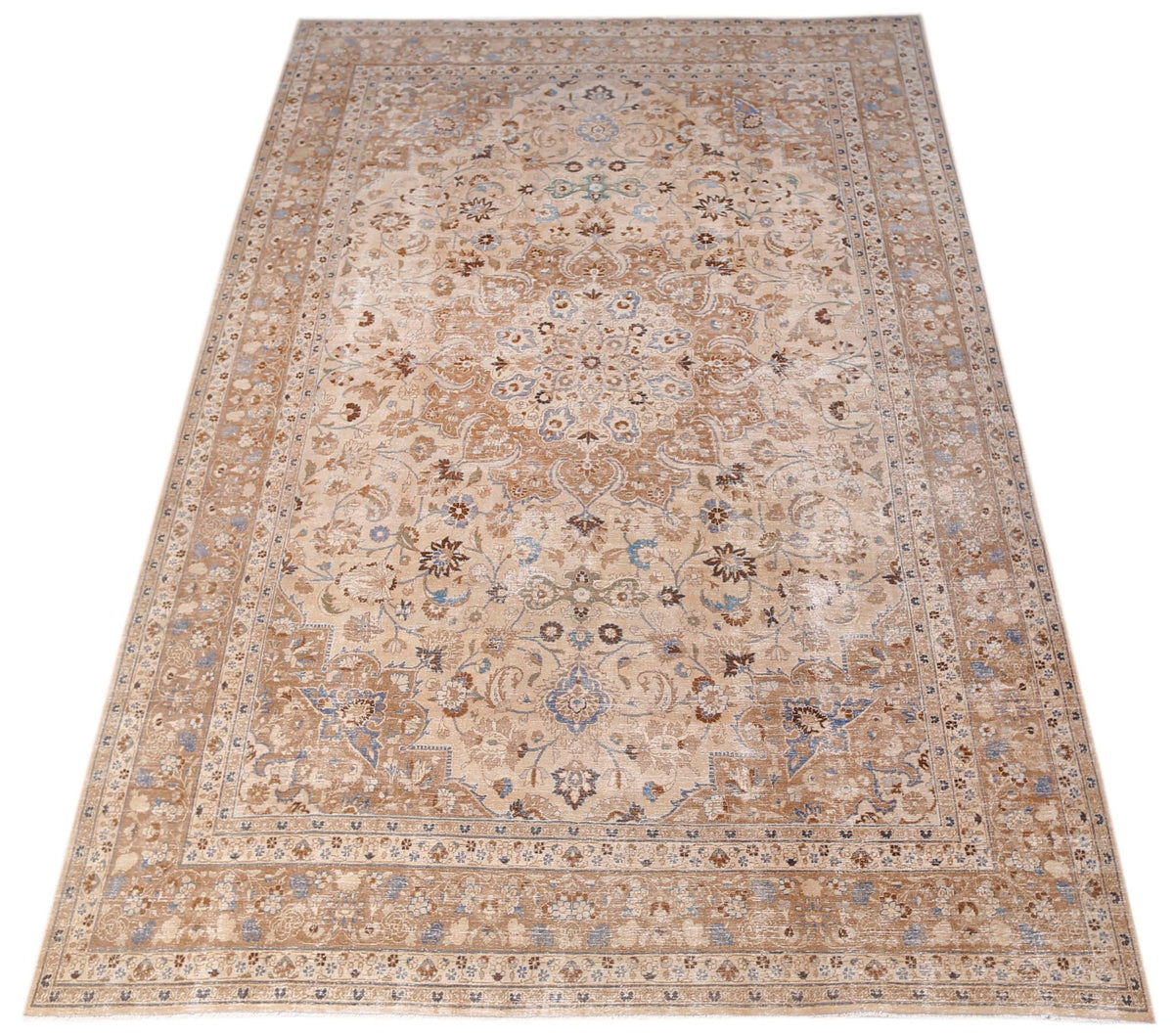 Hand-knotted vintage Persian Tabriz wool rug featuring a beige field with intricate blue and brown floral motifs.