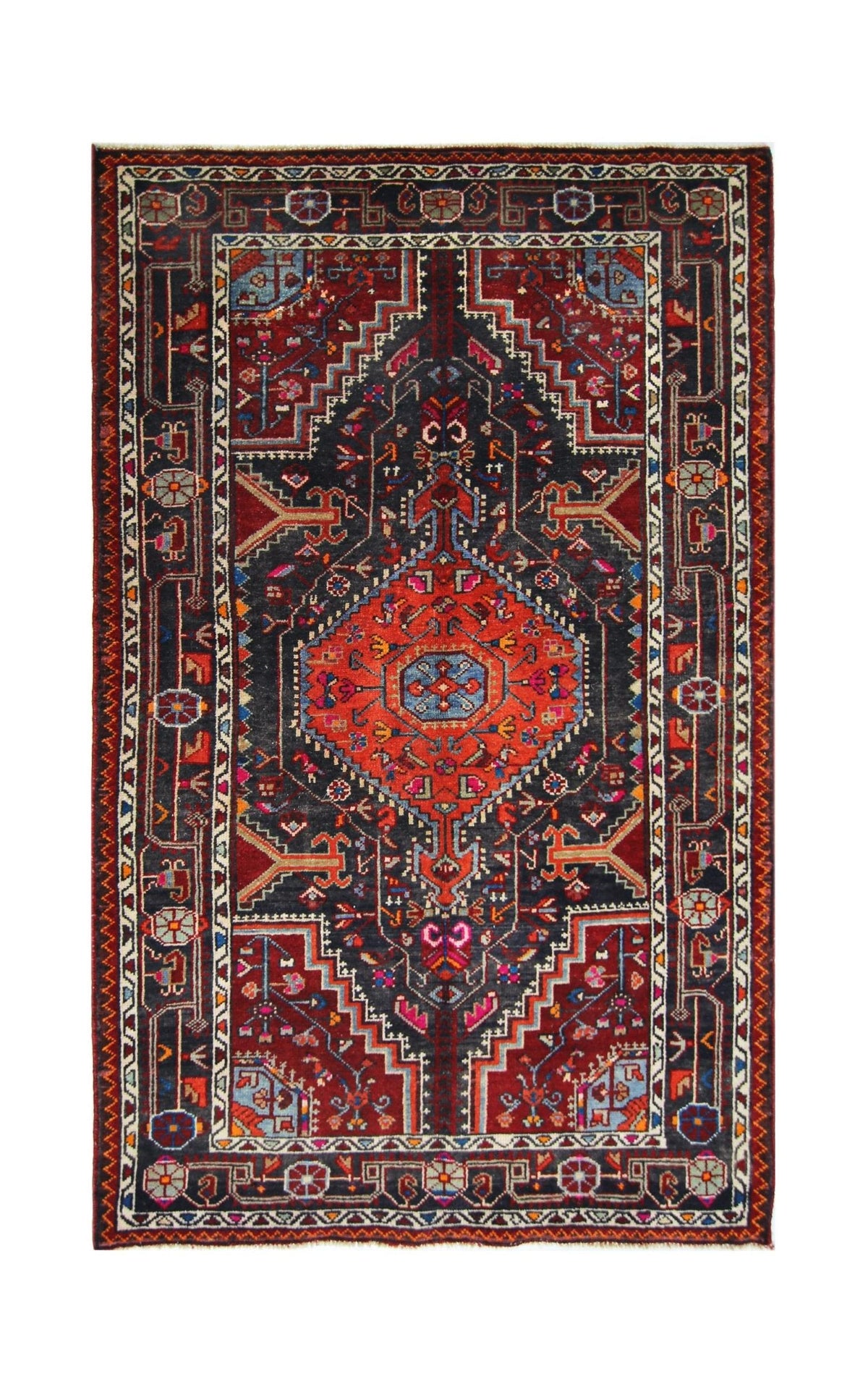Vintage Persian Toyserkan rug featuring a geometric central medallion in deep red, navy blue, and ivory hand-spun wool.
