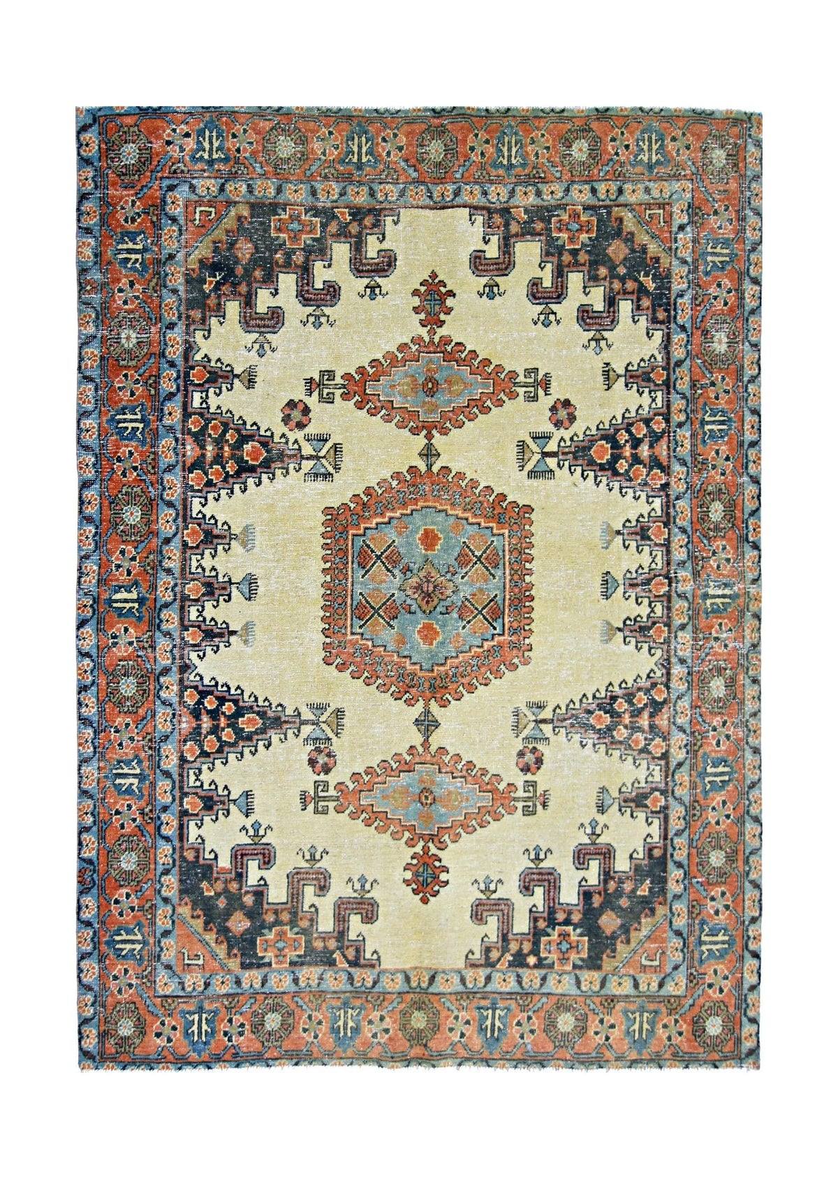 Vintage Persian Wiss wool rug featuring a cream field, geometric medallions, and intricate tribal borders in red and blue.