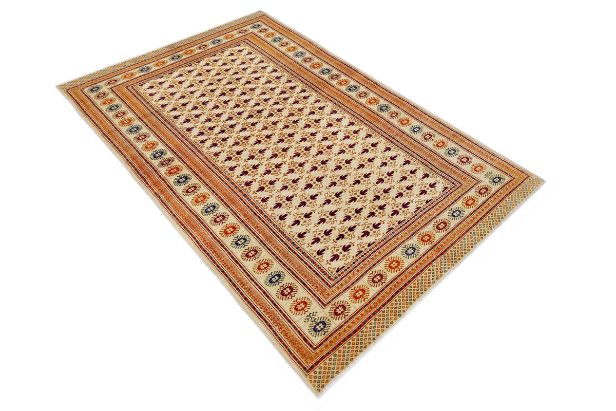Hand-knotted Pakistani Princess Bokhara rug with cream field, repeating purple guls, and intricate orange and blue borders.
