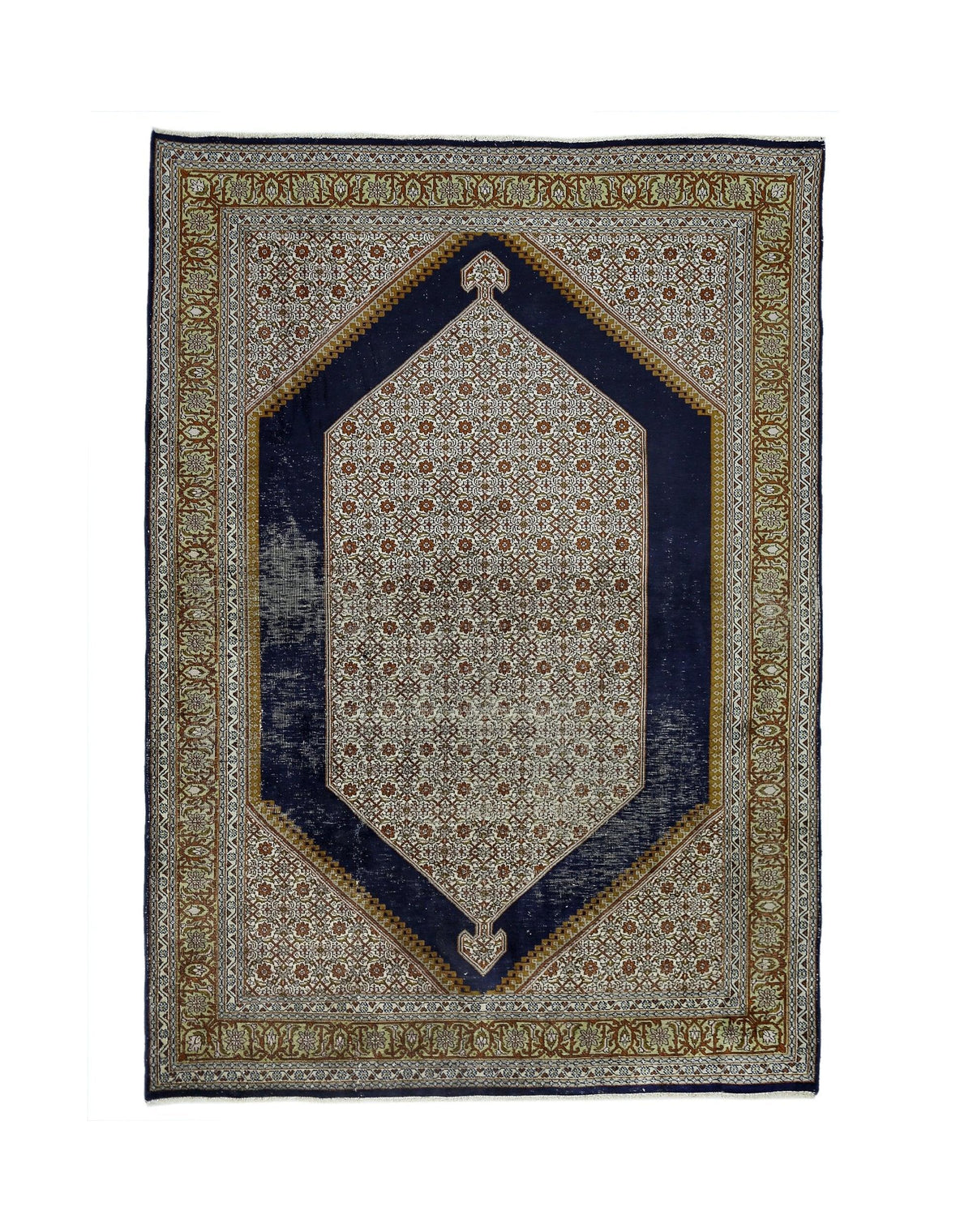 A vintage handmade Kashmiri silk rug featuring a central floral medallion on a dark blue field.