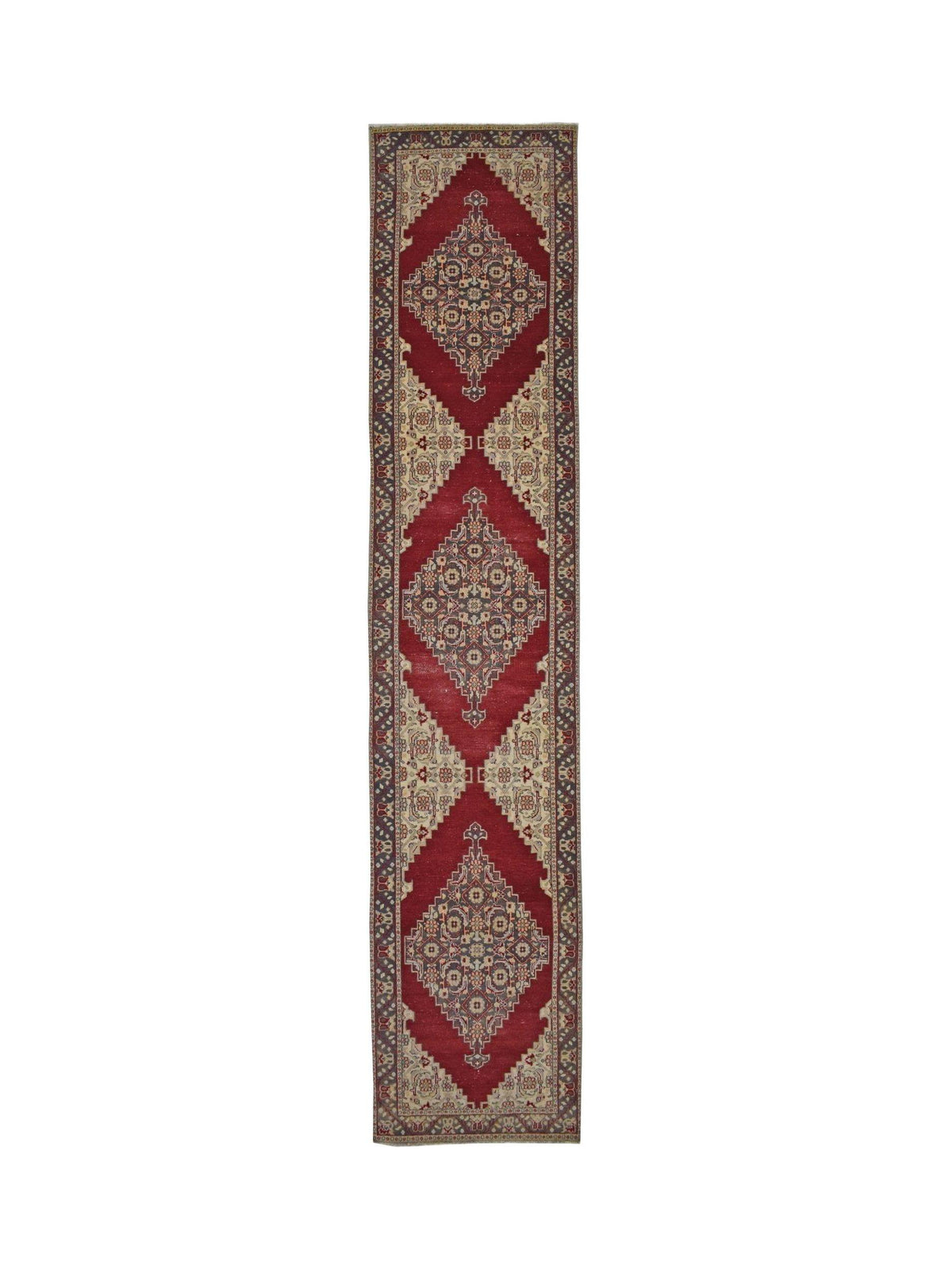 Vintage Turkish Kayseri runner featuring a red field with repeating diamond medallions in cream and blue tones.