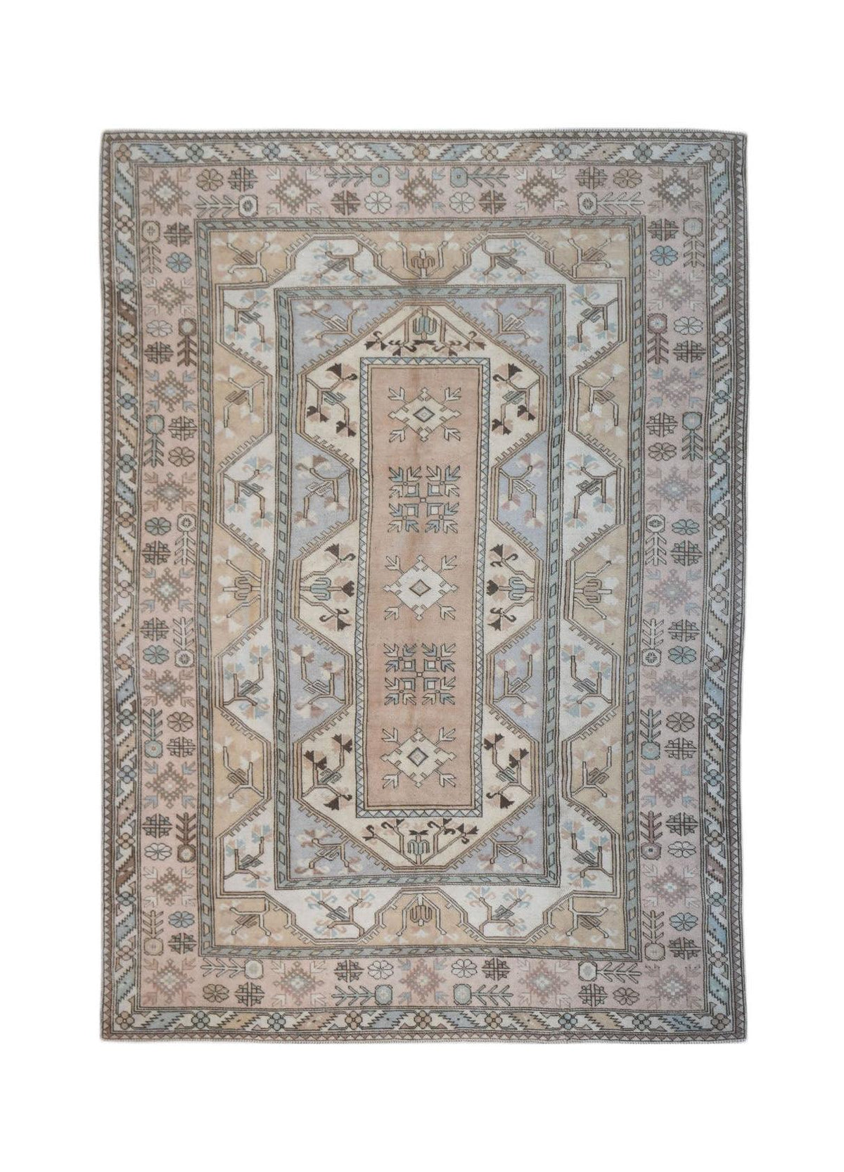 Vintage Turkish Milas rug featuring a geometric prayer niche, botanical motifs, and stepped borders in soft brown and blue.