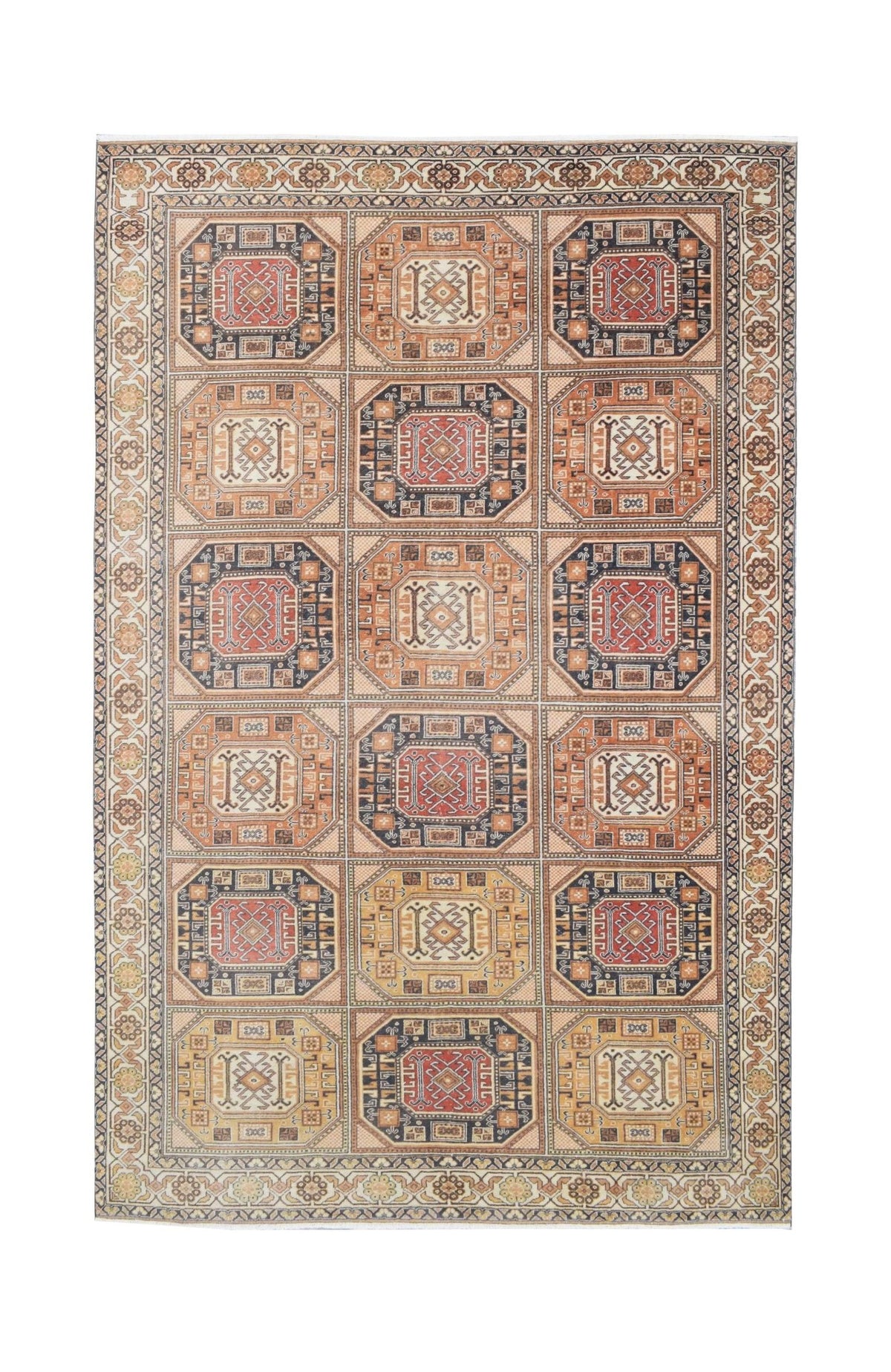 A vintage handmade Turkish Oushak rug featuring a grid of geometric medallions in warm earth tones.