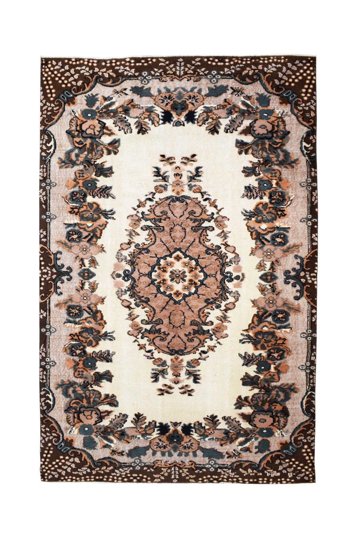 A vintage Turkish Isparta rug featuring a central floral medallion on a cream field with dark borders.