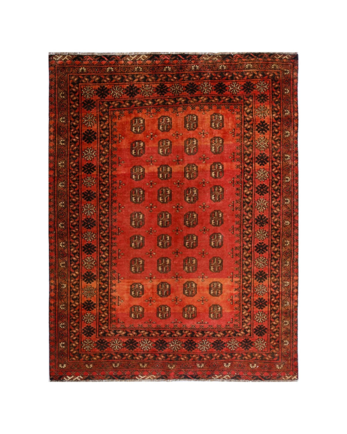 A vintage handwoven Afghan Turkmen rug featuring a repeating geometric pattern on a red field.