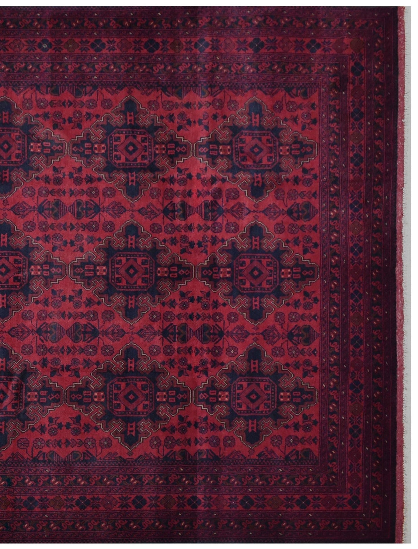 Handmade Afghan Khal Mohammadi wool rug featuring a deep red field with geometric blue motifs.