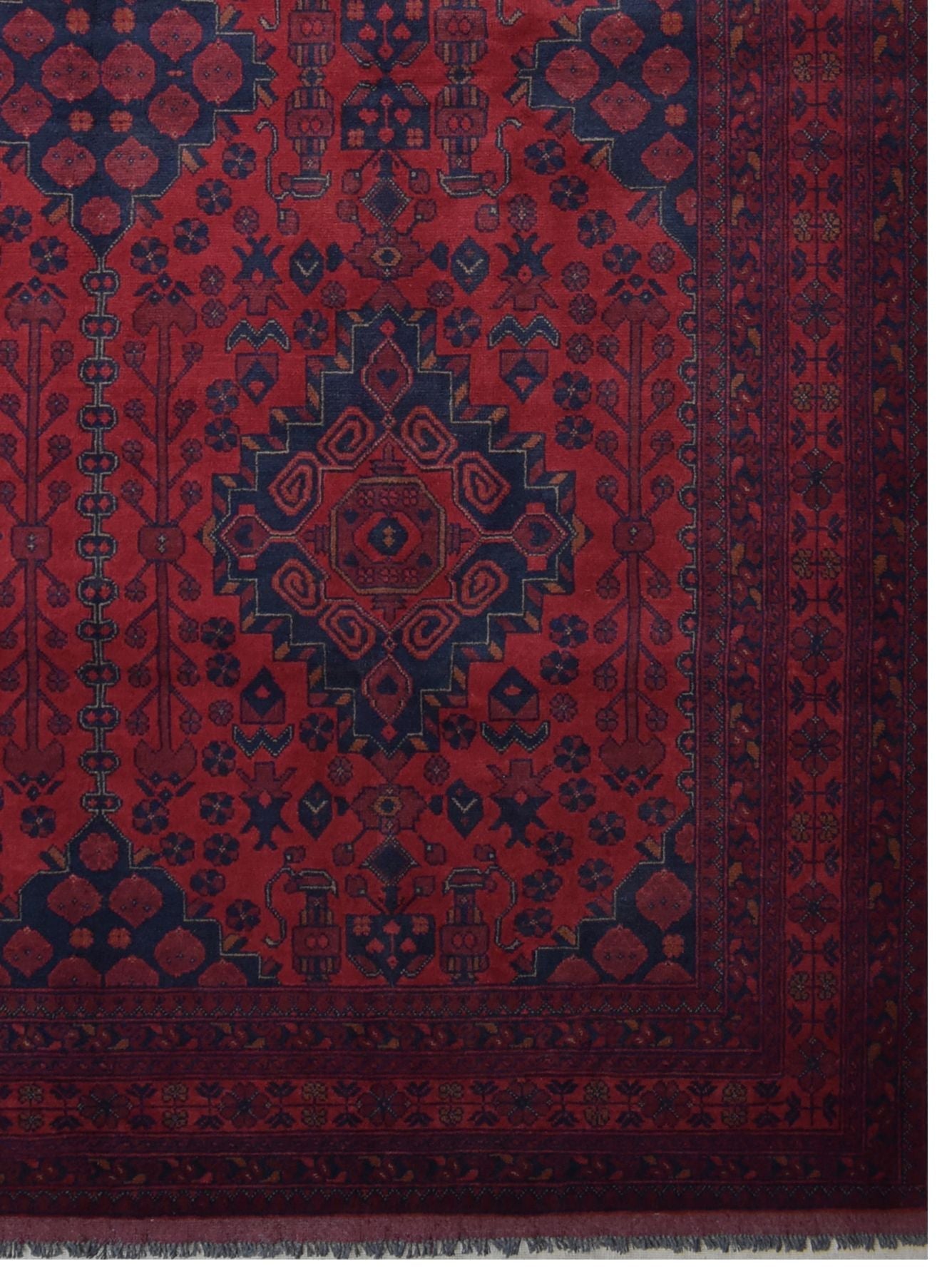 Handmade Afghan Khal Mohammadi wool rug featuring deep red tones and geometric blue patterns.