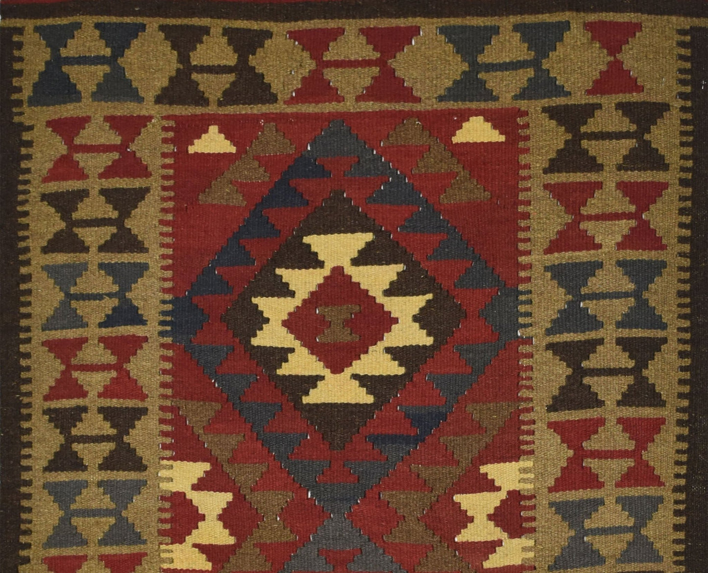 Handmade Afghan Maimana kilim rug featuring a geometric diamond pattern in red, brown, and tan.