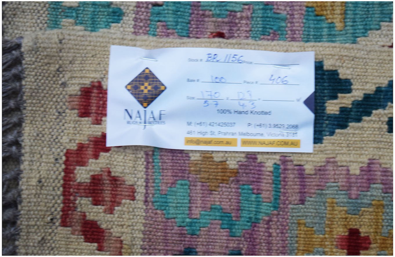 Afghan Maimana Kilim with geometric patterns in red, teal, and yellow.