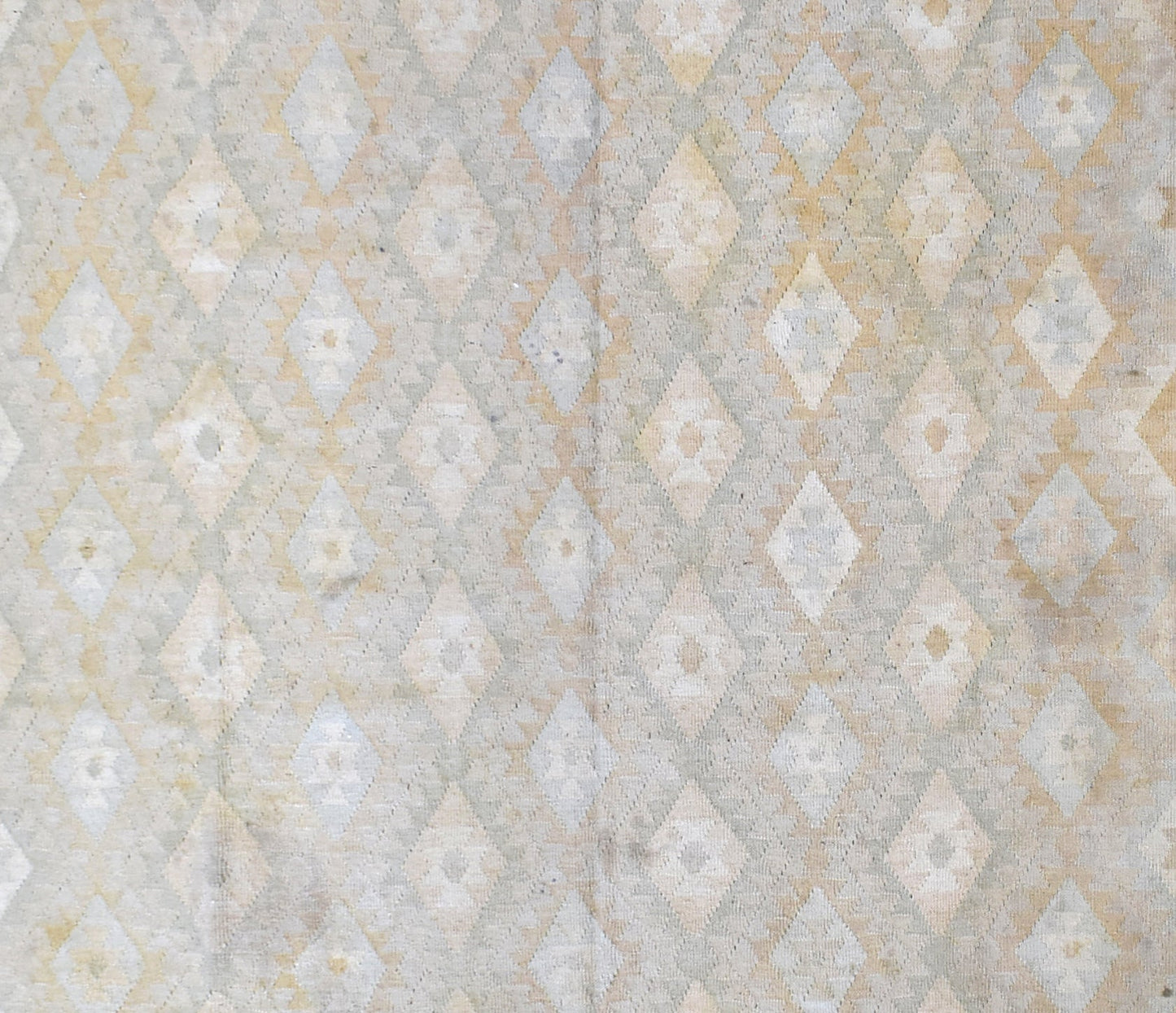 Handmade Afghan Maimana kilim rug featuring a repeating geometric diamond pattern in neutral tones.