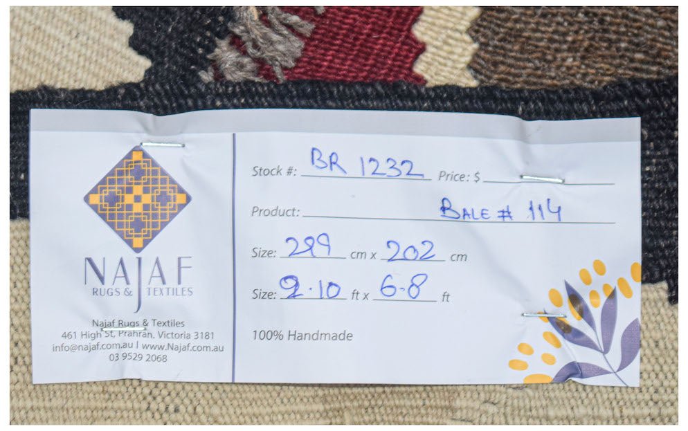 Afghan Maimana Kilim with geometric patterns and a handwritten tag.