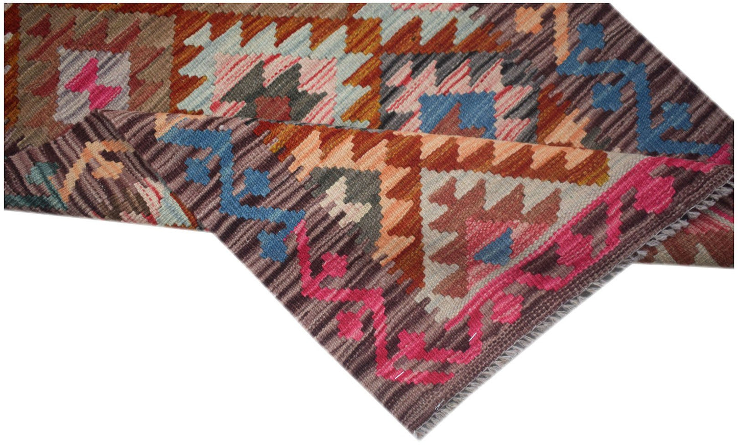 Handwoven Afghan Maimana kilim runner featuring a geometric pattern in vibrant wool colors.