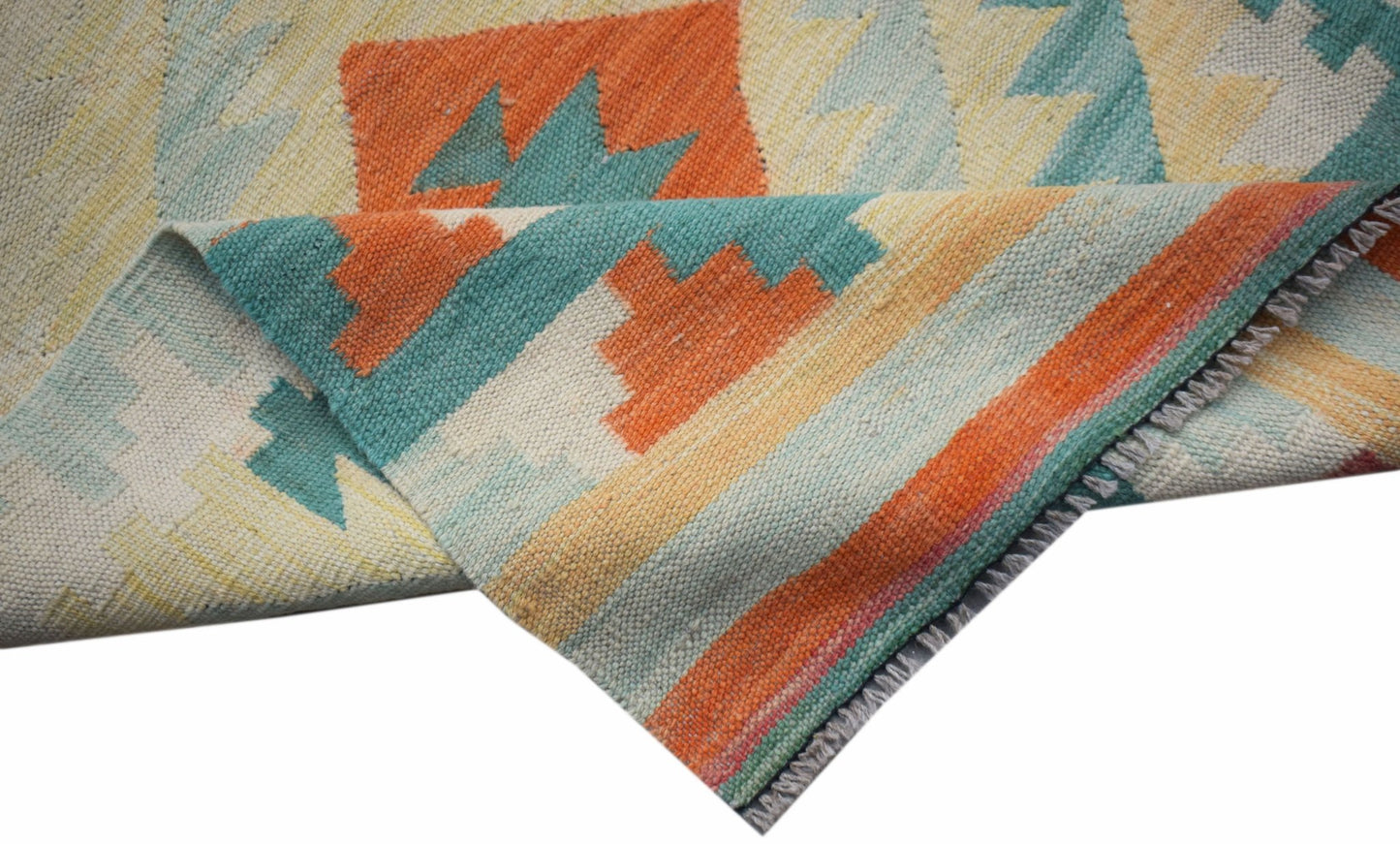 A handwoven Afghan Maimana kilim runner featuring geometric patterns in orange, teal, and cream.