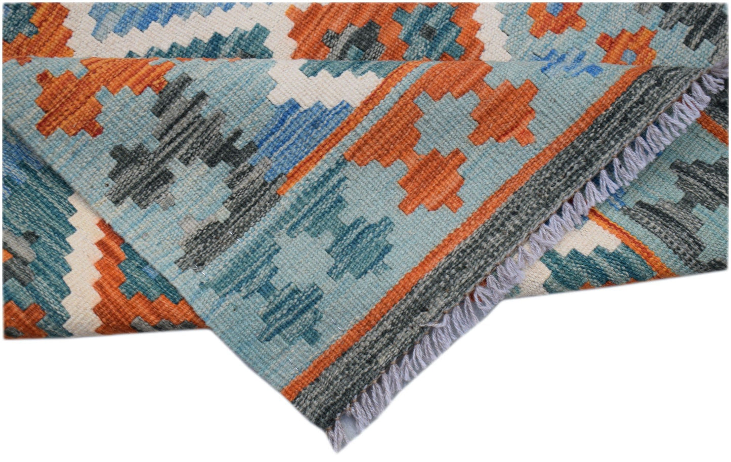 A handmade Afghan Maimana kilim runner featuring a geometric pattern in orange, blue, and grey.