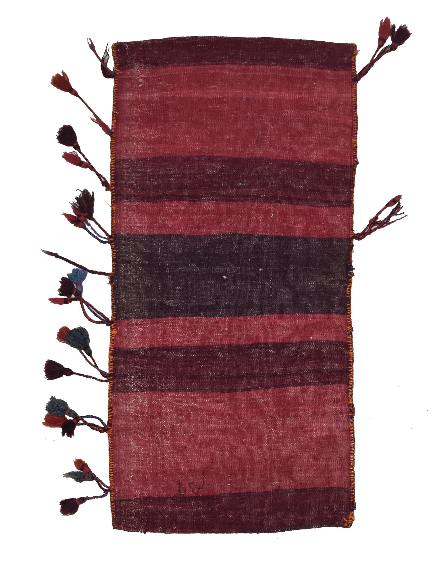 A vintage handmade Afghan wool saddle bag featuring horizontal red and dark brown stripes.