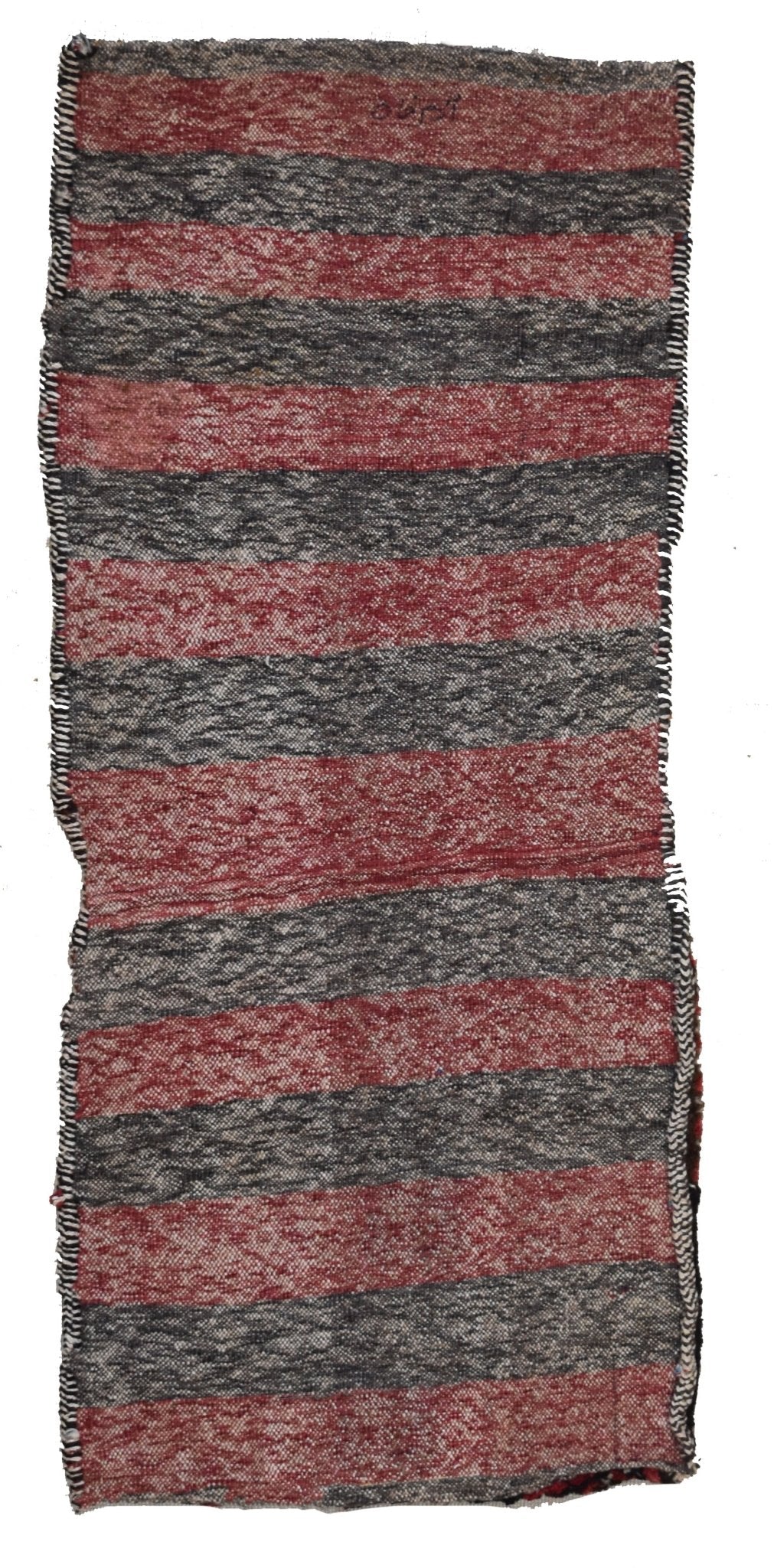 A handmade vintage Afghan saddle bag featuring alternating horizontal stripes of red and grey wool.