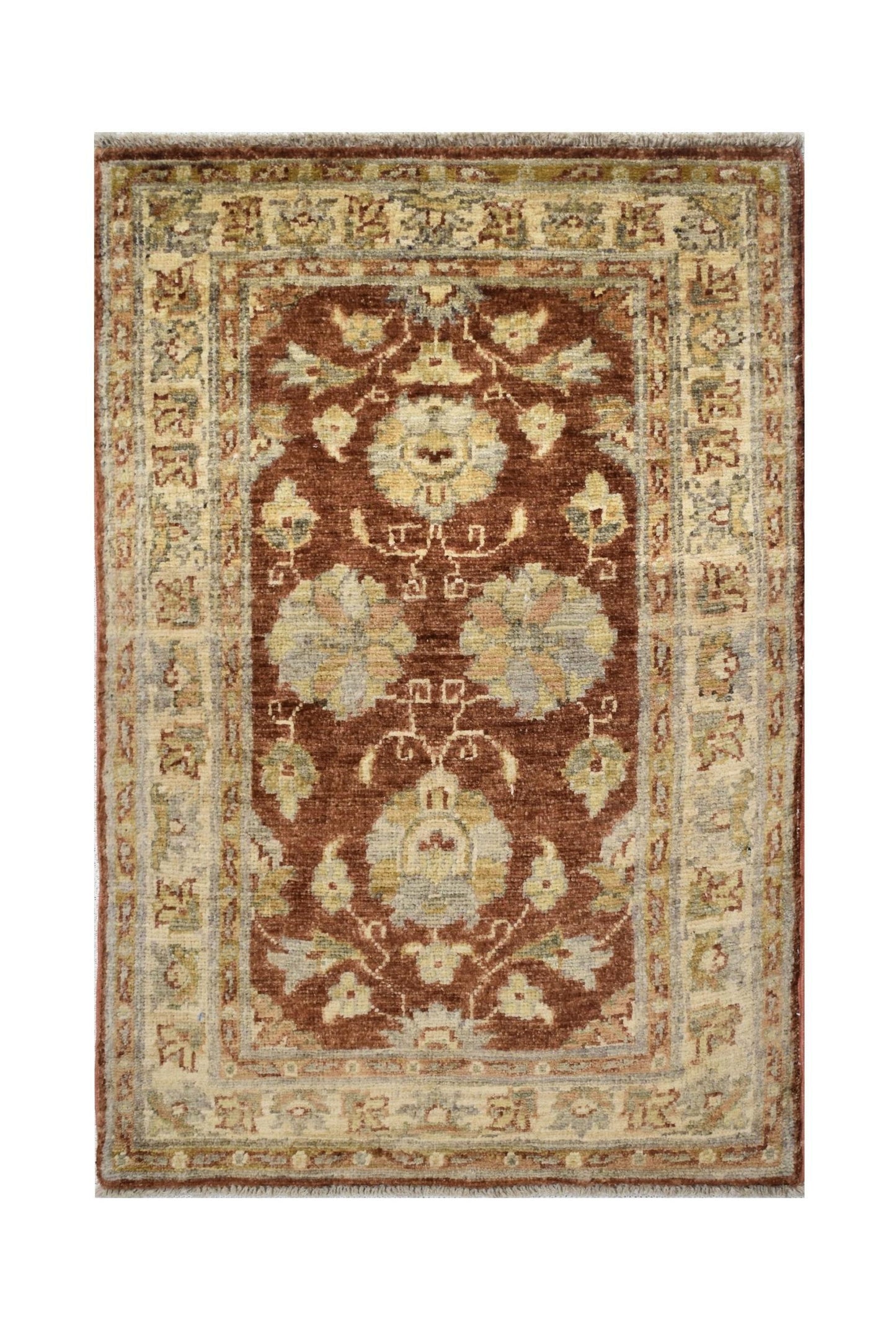 A handmade Afghan Chobi rug featuring a floral pattern in earthy tones on a deep brown background.