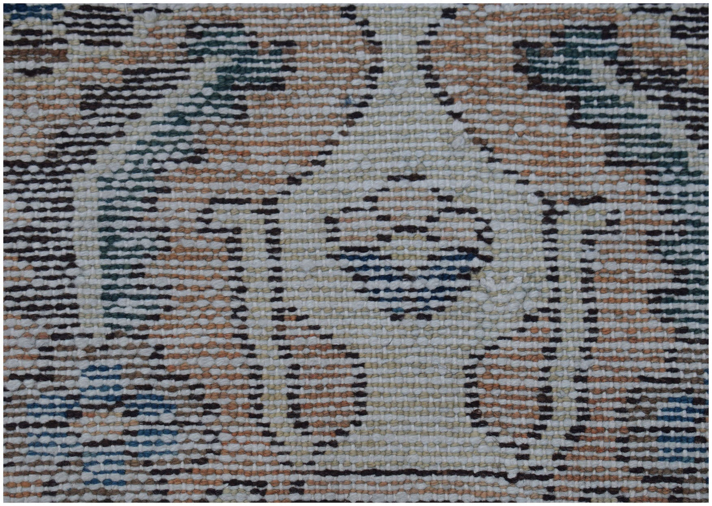 A close-up view of a vintage Persian Bakhtiari rug featuring intricate geometric and floral patterns.