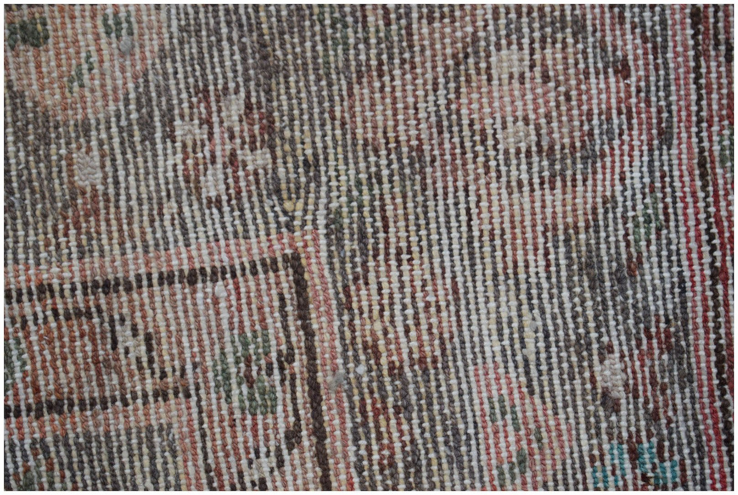 A close-up view of a vintage Persian Hamadan runner featuring intricate wool patterns.