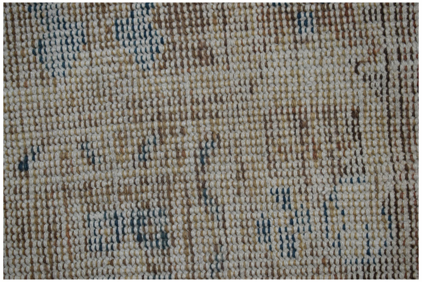 A close-up view of a handwoven vintage Persian Hamadan rug featuring a worn, textured wool pattern.