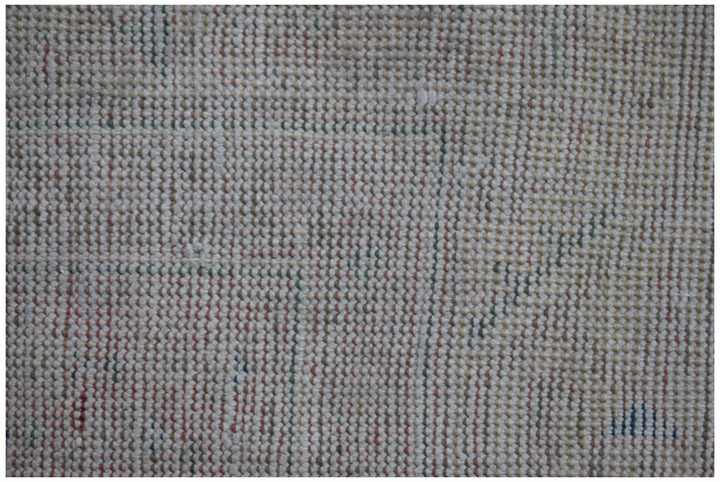A handwoven vintage Persian rug featuring intricate traditional patterns in wool.