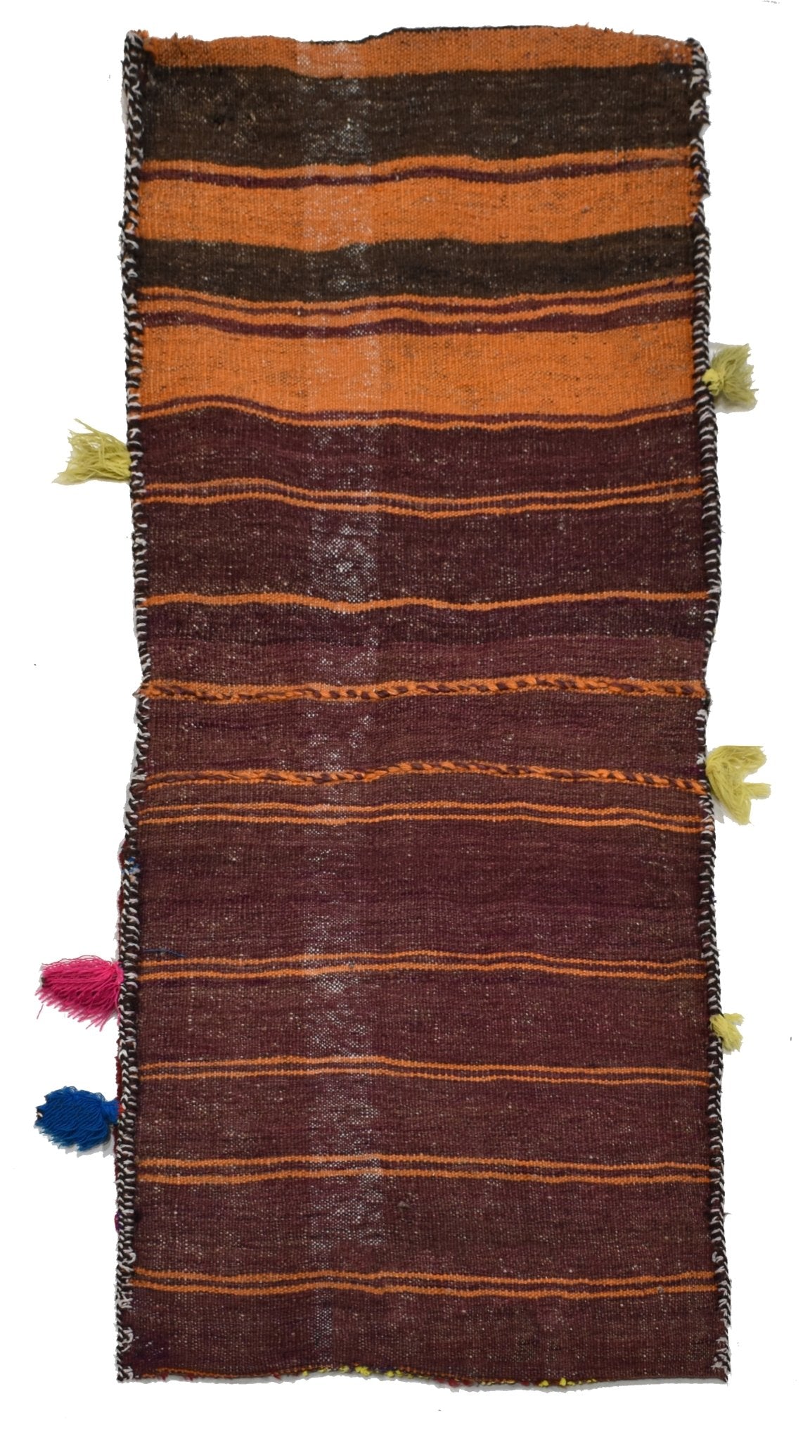 A vintage handmade Afghan wool saddle bag featuring horizontal orange and brown stripes.
