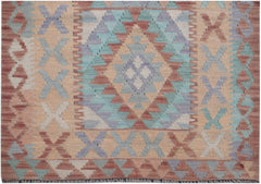 Handmade Afghan Maimana kilim runner featuring a geometric pattern in muted earth tones.