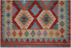 Handmade Afghan Maimana kilim runner featuring a colorful geometric pattern on a wool base.