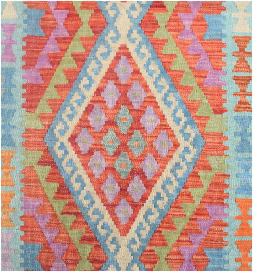 Handmade Afghan Maimana kilim runner featuring a vibrant geometric diamond pattern in wool.