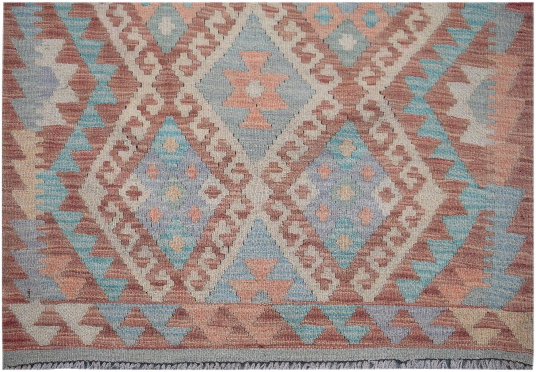 Handmade Afghan Maimana kilim runner featuring a geometric diamond pattern in muted earth tones.