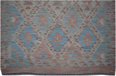 Handmade Afghan Maimana kilim runner featuring a geometric diamond pattern in blue and peach tones.