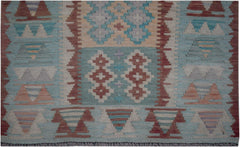 Handmade Afghan Maimana kilim runner featuring geometric patterns in blue, red, and beige tones.