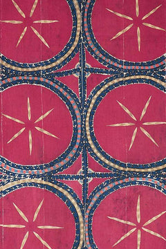 Antique silk Uzbek suzani featuring a repeating pattern of embroidered celestial moon motifs.