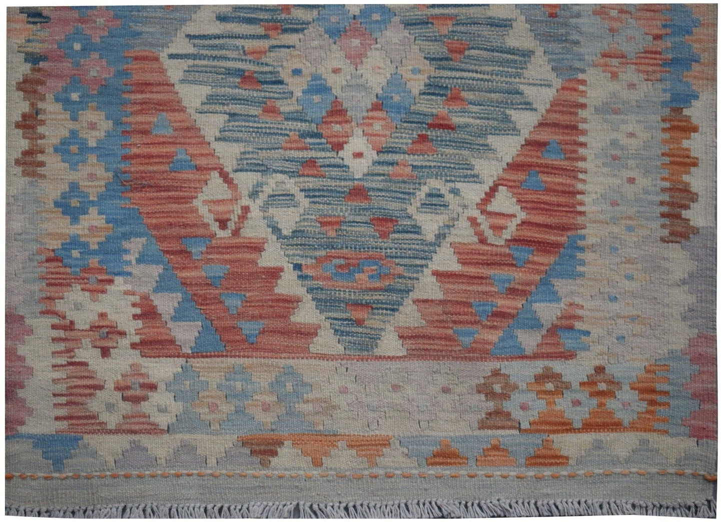 Handmade Afghan Maimana kilim runner featuring a geometric pattern in blue, red, and cream tones.