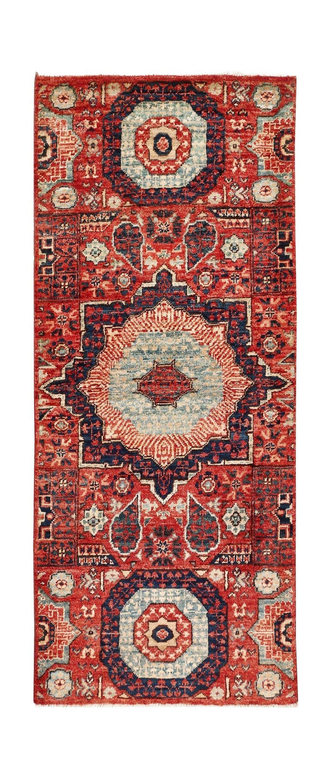 A handmade Afghan Chobi runner rug featuring a traditional Mamluk medallion design in red and blue.