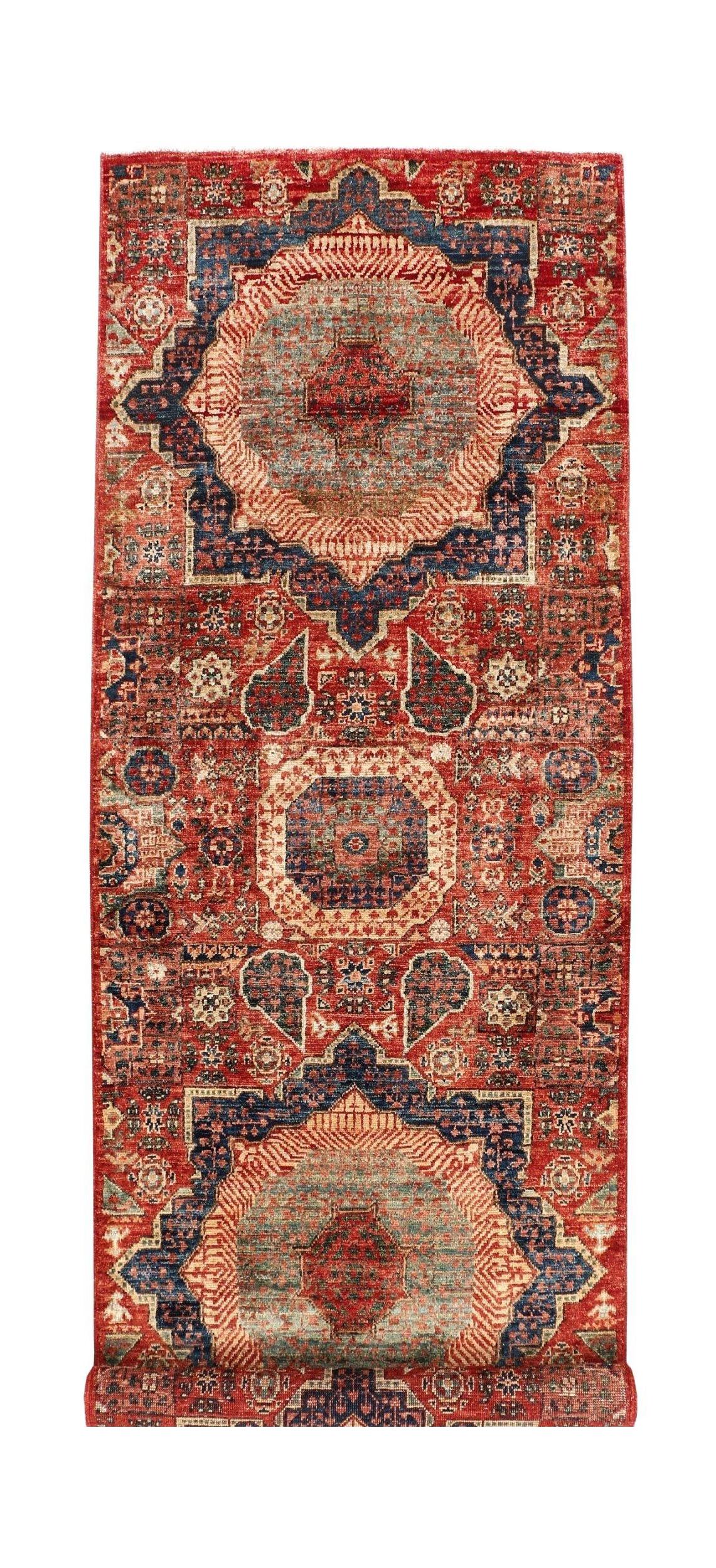 Handmade Afghan Chobi runner rug featuring a traditional Mamluk medallion design in red and blue.