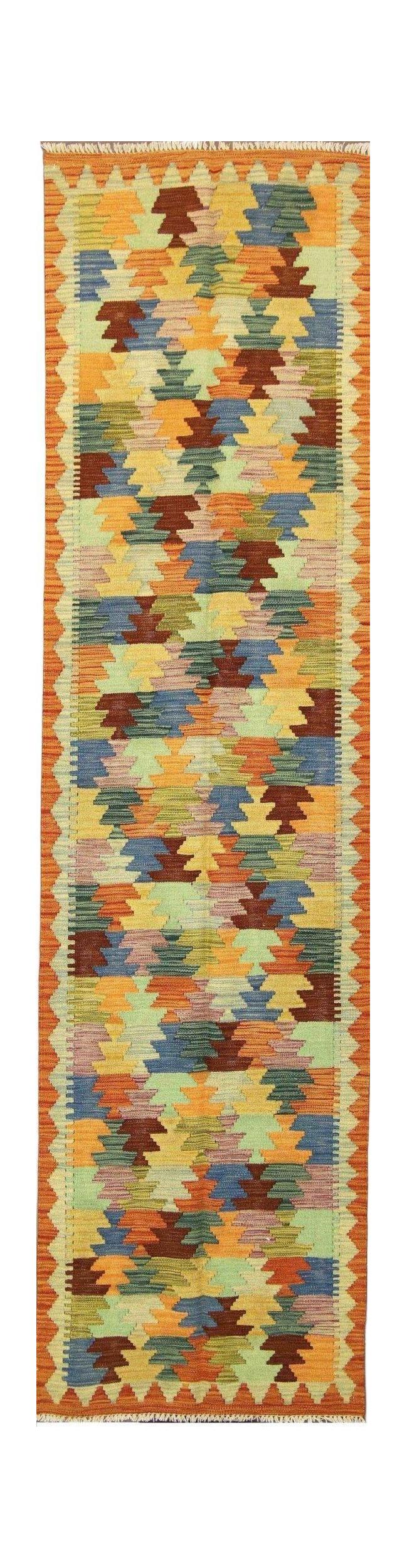 Handmade Afghan Maimana wool runner rug featuring a colorful geometric pattern.