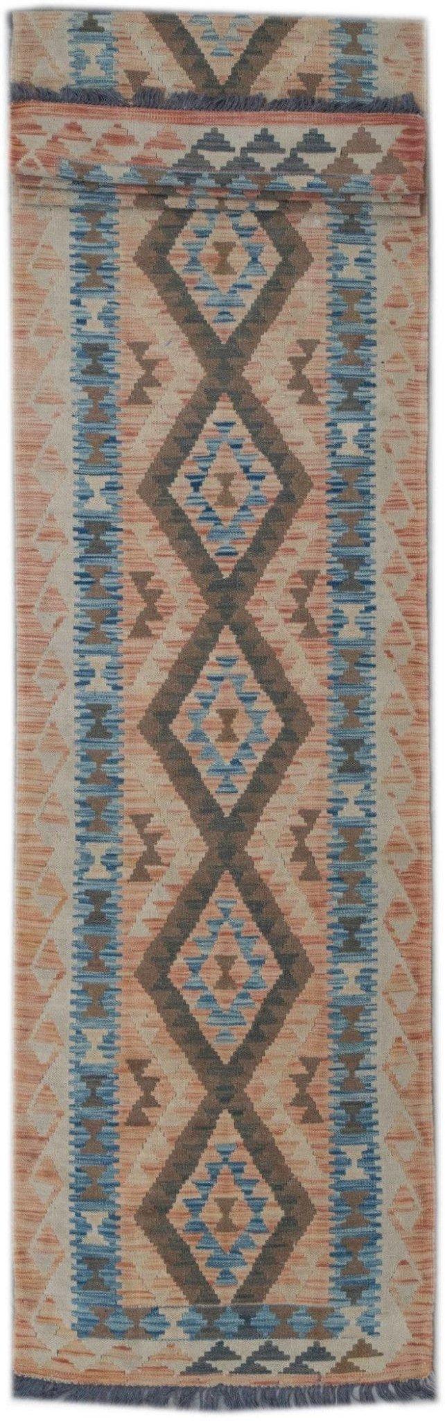 Handmade Afghan Maimana wool runner rug featuring a geometric diamond pattern in blue and orange.