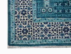 A handmade Afghan Balkh rug featuring a detailed blue and cream Mamluk geometric pattern.