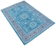 A rectangular Afghan Chobi rug featuring a detailed blue and white Mamluk medallion pattern.