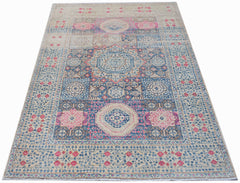 Handwoven Afghan Balkh rug featuring a traditional Mamluk medallion pattern in blue and pink.