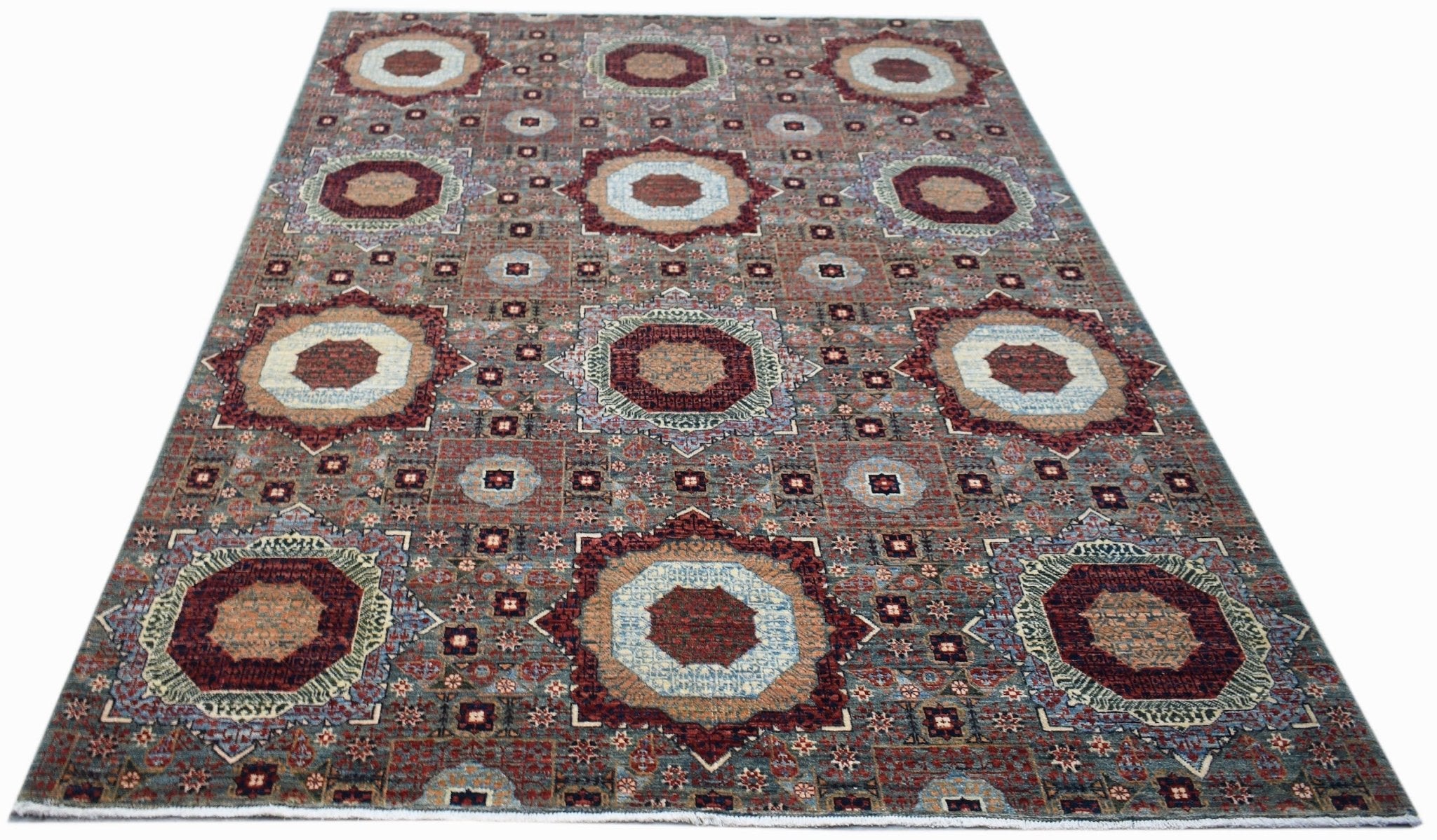Handwoven Afghan Balkh rug featuring a traditional Mamluk medallion pattern in earthy tones.