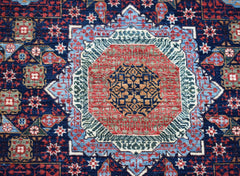Handwoven Afghan Balkh rug featuring a detailed Mamluk medallion in red, blue, and gold tones.